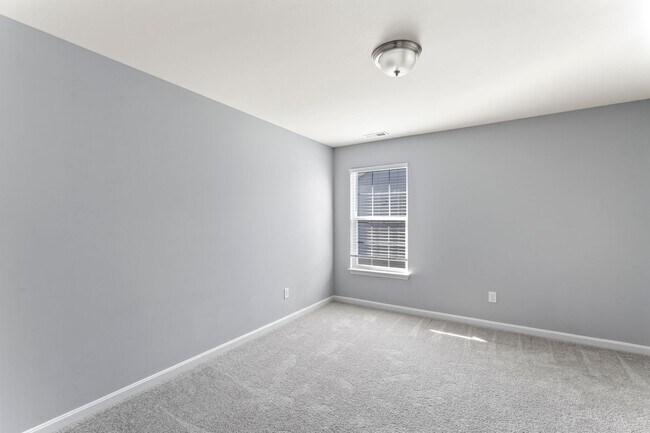Building Photo - Stunning 4-Bedroom Home with Serene Pond Views