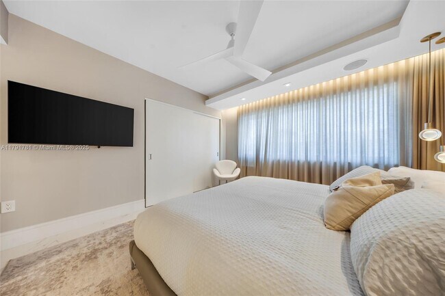 Building Photo - 10190 Collins Ave