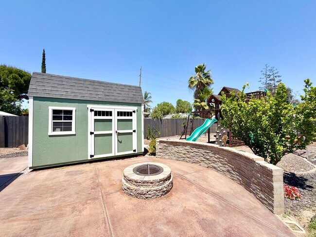 Building Photo - Beautifully Renovated 4 Bedroom Home with INCLUDED Solar, Large Backyard & Gazebo