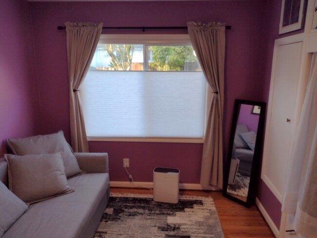 Second bedroom has a wonderful large window looking over the sunny backyard. - 4157 SE Brooklyn St