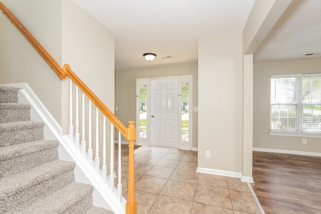 Building Photo - 5209 Carriage Woods Dr