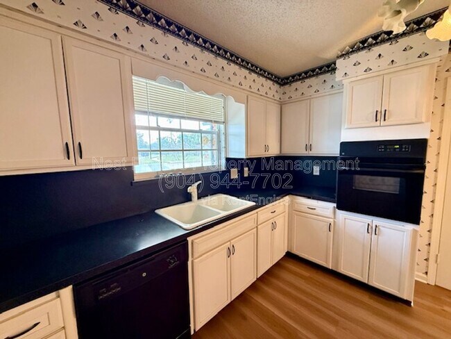 Building Photo - 5907 Gumwood Dr