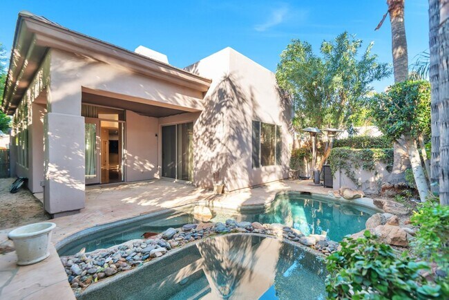 Building Photo - Experience luxury living in the prestigious Gainey Village!