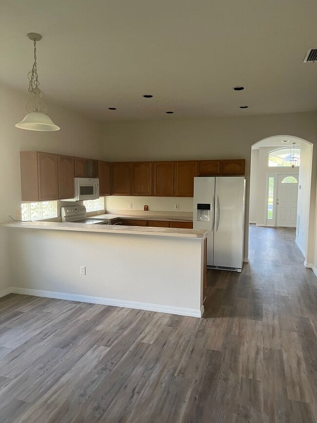 Building Photo - Water view 4/2 home in gated Spring Glen Community- Debary!