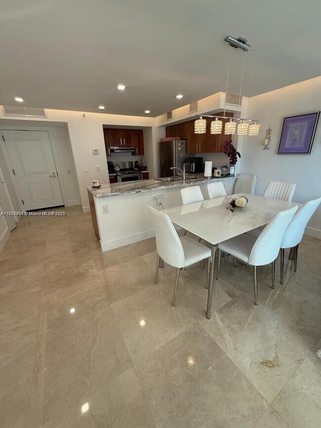 Building Photo - 9499 Collins Ave
