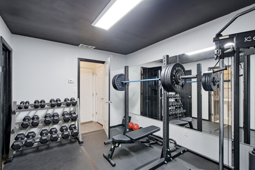 Bedroom converted to full home gym (option to rent equip. or to return as bedroom) - 1225 Liberty Pky NW