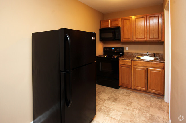 Small Studio Furnished Kitchen - Forest Ridge Apartments