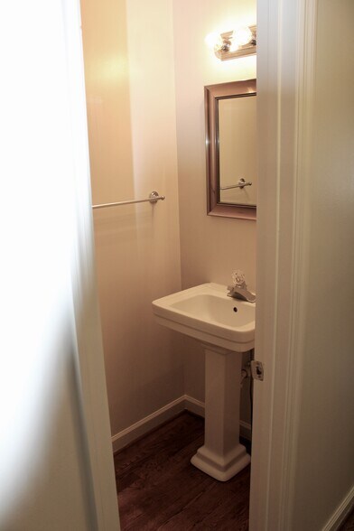 Half bath off living room. - 161 37th Ave N