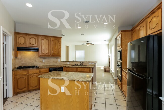 Building Photo - You Can Afford to Dwell Well.