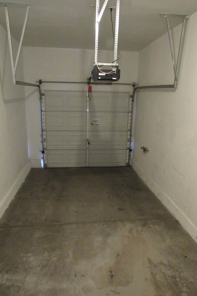 Building Photo - AMAZING 2 STORY TOWNHOME LOCATED IN A GATE...