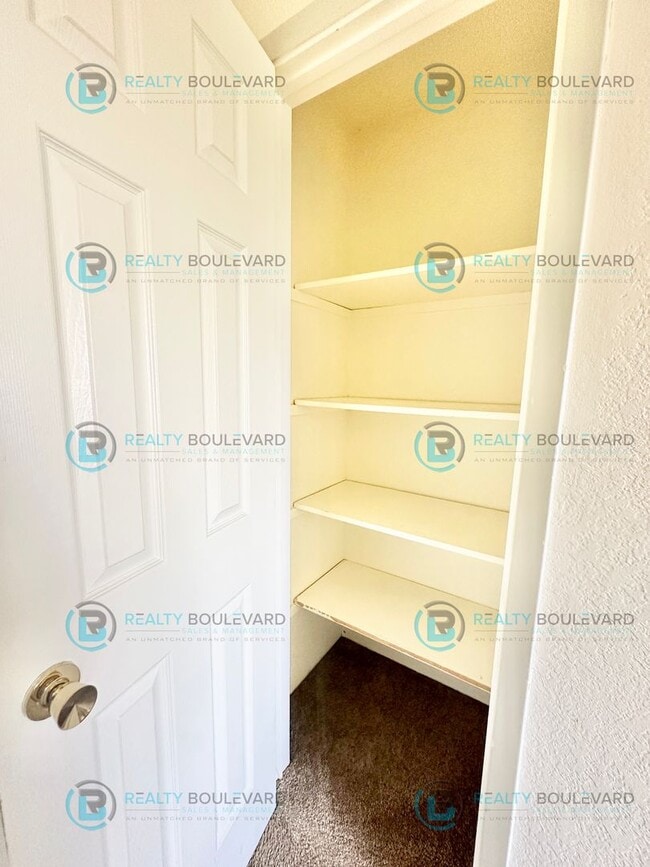 Building Photo - This delightful 2-bedroom, 1-bathroom condo perched upstairs offers an irresistible opportunity y...