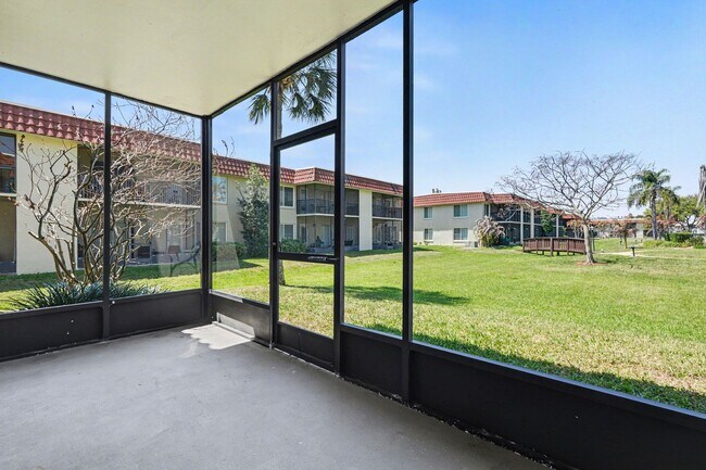 Building Photo - Must see 1st floor, end unit with lots of natural light in St Lucie Gardens.