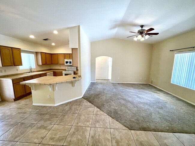 Building Photo - Inviting 3 Bedroom Home with RV Parking an...