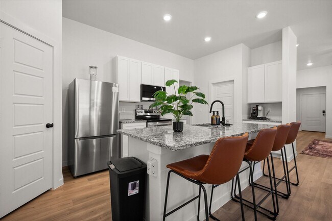 Building Photo - Four Beds, All Appliances, All Smiles!