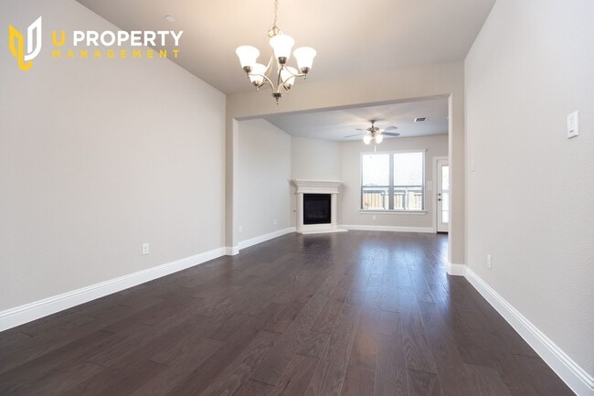 Building Photo - Luxury Townhome- wood flooring. Great location