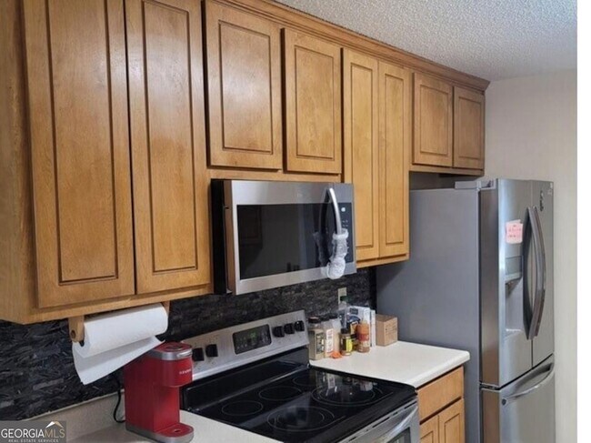 Building Photo - 5774 Colonnade Dr