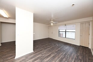 Spacious living room with hardwood-style flooring - Chapel Ridge of Ripley