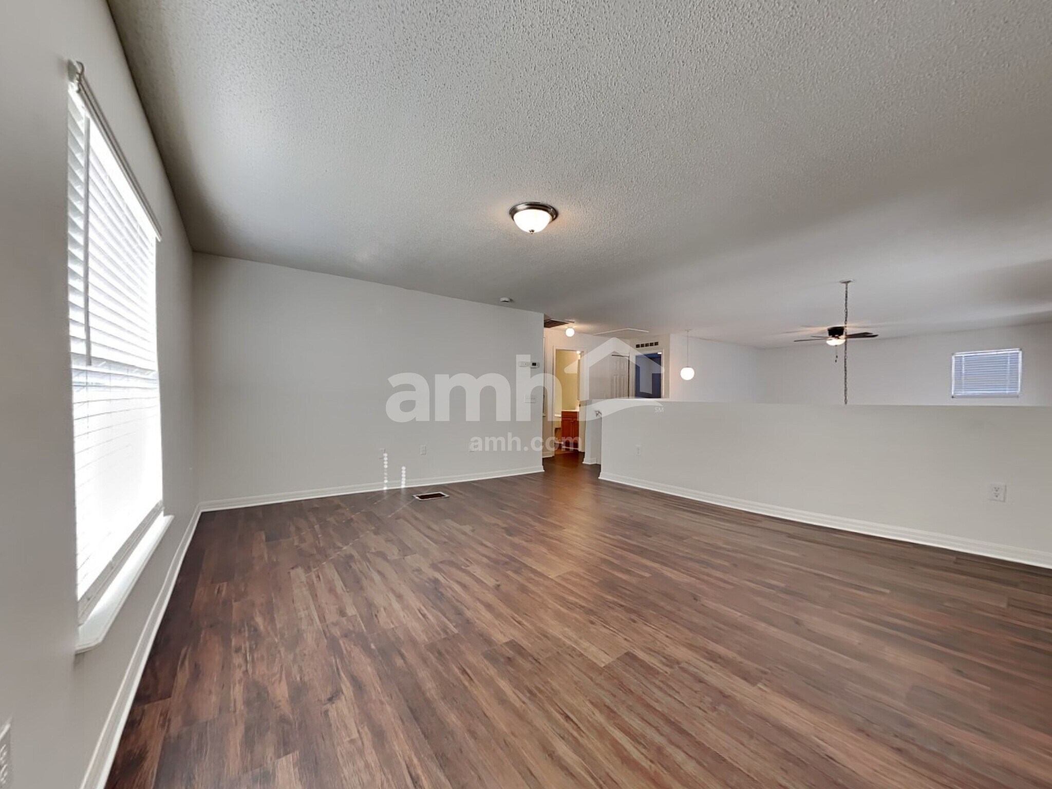 Building Photo - 6686 Gentle Oaks Dr E