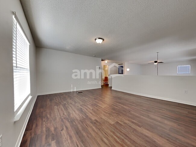 Building Photo - 6686 Gentle Oaks Dr E