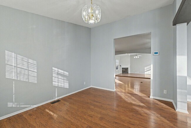 Building Photo - 3-Bed Home with Fireplace, Fenced Yard & Flexible Living Space