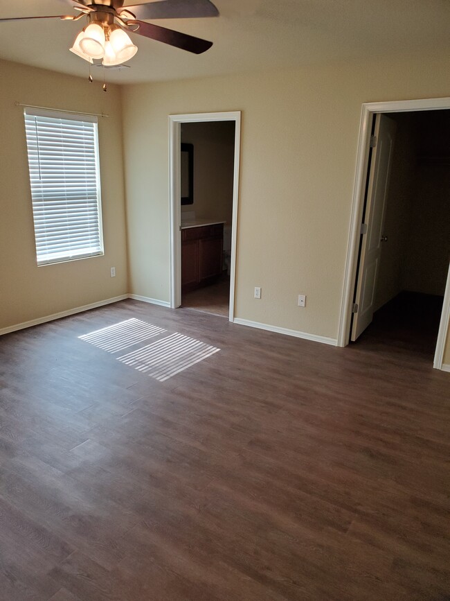 Master bedroom view from corner into bathroom and closet - 16021 S 83rd East Ave