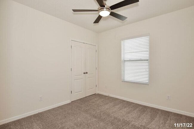 Building Photo - Spacious 3/2.5 Townhome with a 2 Car Garage and a Beautiful Pond View in Westwood Condos - Orlando!