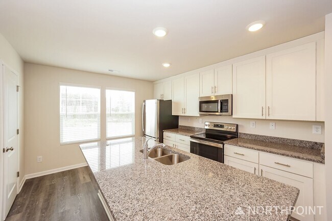Building Photo - 3-Bedroom, 3.5 Bath Townhome for Rent in Mooresville, NC | Attached Garage & Modern Kitchen