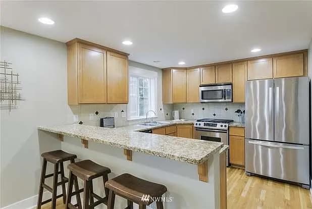 Building Photo - 8403a 8th Ave NW