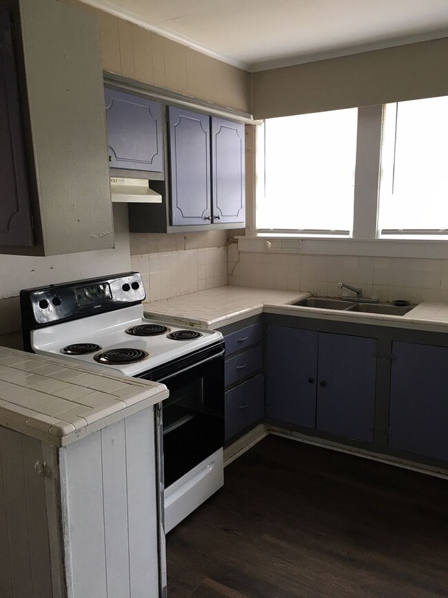 Building Photo - One Bedroom Duplex
