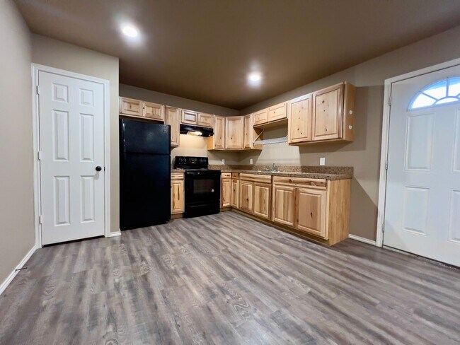 Building Photo - Charming 3-Bedroom Home with Hardwood Floors & Large Backyard – Lubbock, TX