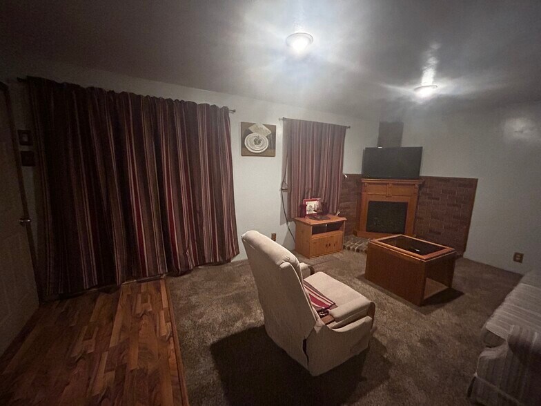 Living room with fireplace - 2063 Newhaven Dr