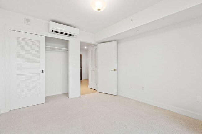 Building Photo - Stylish 1-Bedroom Unit at THE COLLECTION w...