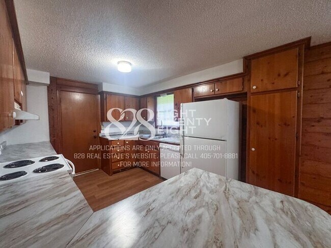 Building Photo - *AVAILABLE NOW!* 2 BED/1 BATH COZY LOG CABIN DUPLEX IN NOBLE, OK!