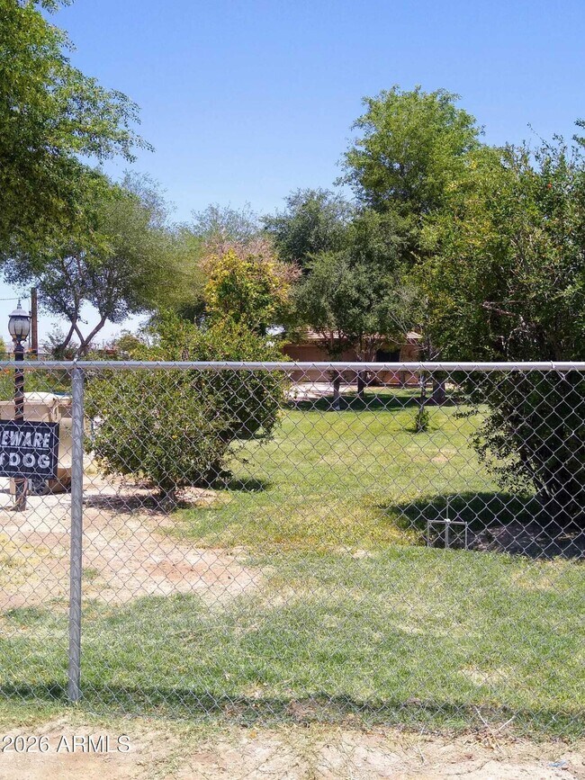 Building Photo - 242 N Pima Rd