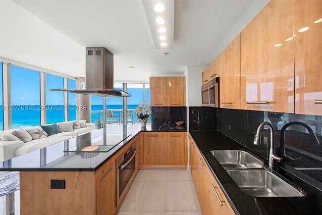 Building Photo - 6899 Collins Ave