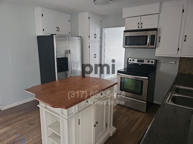 Building Photo - 7056 Caroline Ave