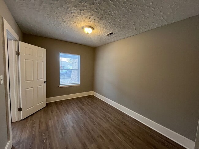 Building Photo - Step inside!  You will love what you see.-Coming soon