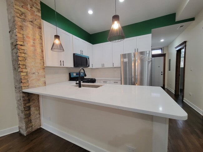 Building Photo - 1644 S Millard Ave