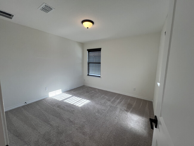 2nd Guest Room: Used as office and guest bedroom. Has two windows, both Blackout Blinds included. - 318 Indian Wheat