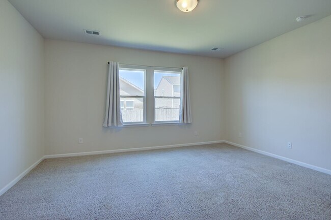 Building Photo - Spacious 4BR Rental with Stunning Kitchen & Covered Patio