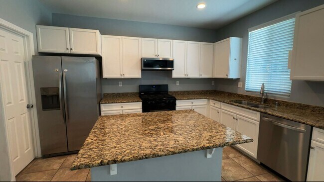 Building Photo - Move in Special! 2 Weeks free!  Home for R...