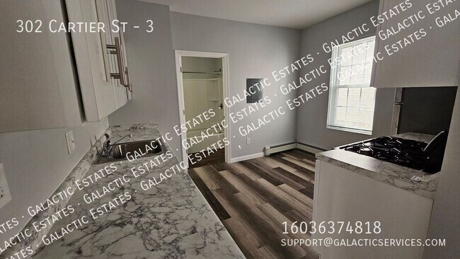 Building Photo - 302 Cartier St