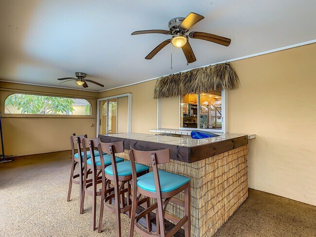 Building Photo - Port Charlotte Waterfront Pool Home - Grea...