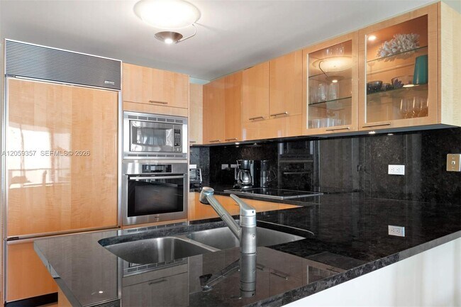 Building Photo - 6799 Collins Ave
