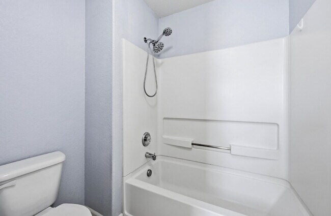 Building Photo - $1,945.95 - 2 Bed, 2.5 Bath Townhome in Colorado Springs with Attached Garage!