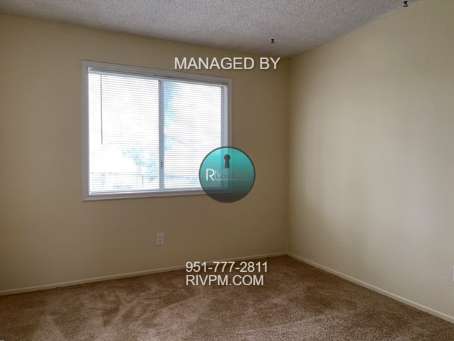 Building Photo - Coming Soon! DISCOVER YOUR DREAM CONDO IN COLTON!!!