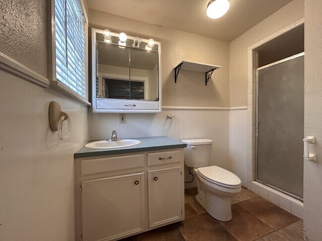 Building Photo - "Charming 4-Bed, 2-Bath Home