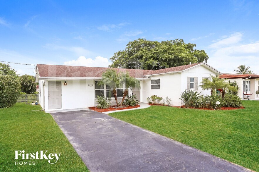 Building Photo - 6119 NW 18th Ct