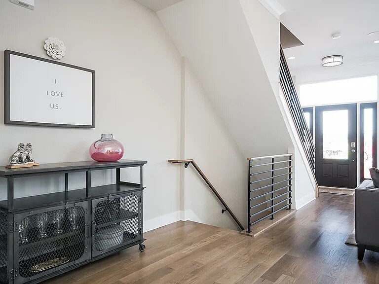 Stairs on main floor leading to basement and top floor - 934 Pullman Pl
