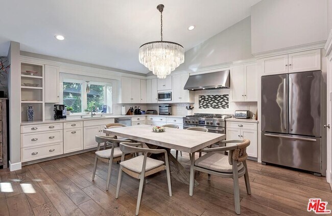 Building Photo - 5721 Tellefson Rd